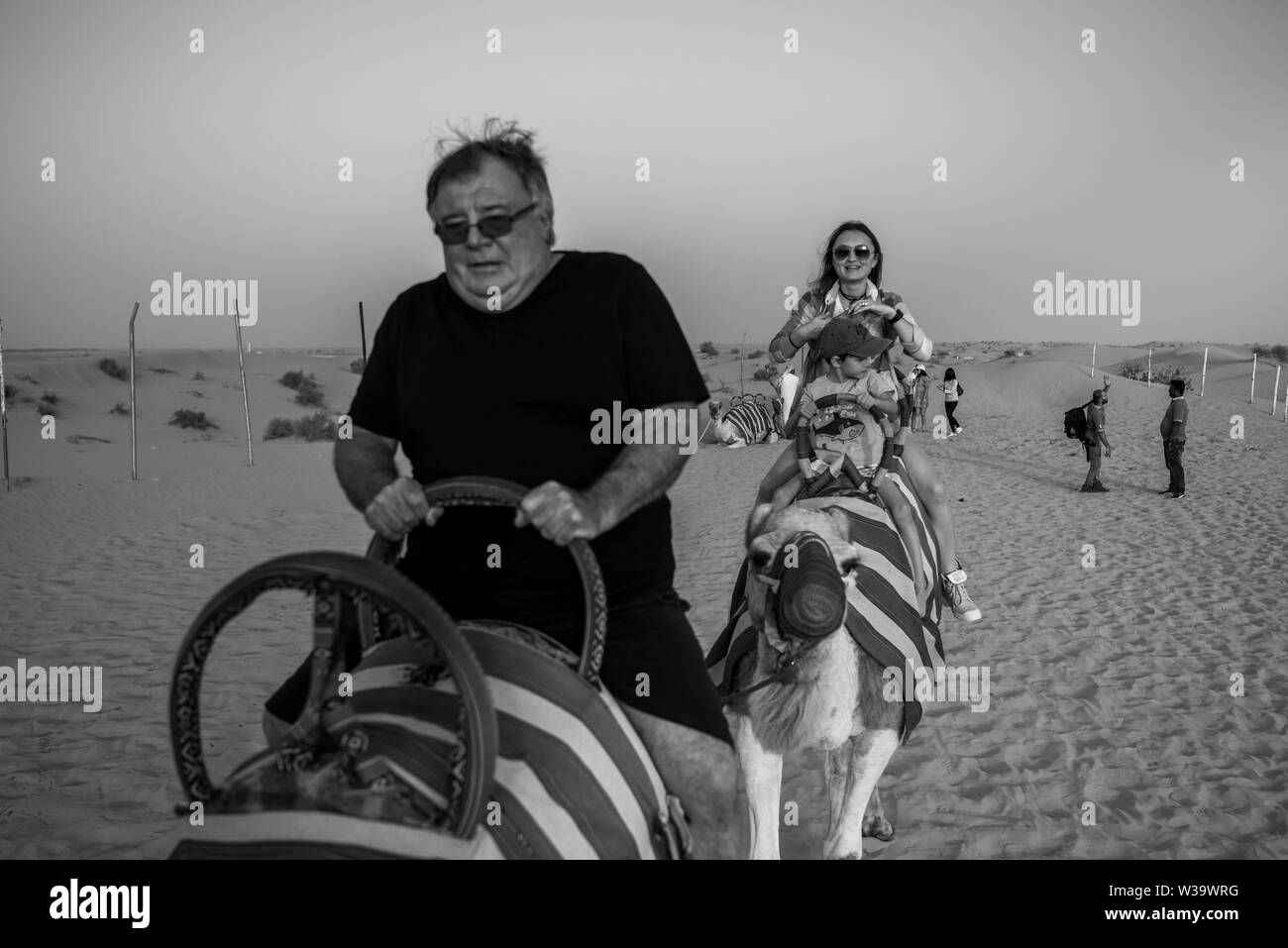 A camel desert trip can be quite a thrilling, but exciting and beautiful experience at the same time. As others say, the desert `camel caravan` goes s Stock Photo